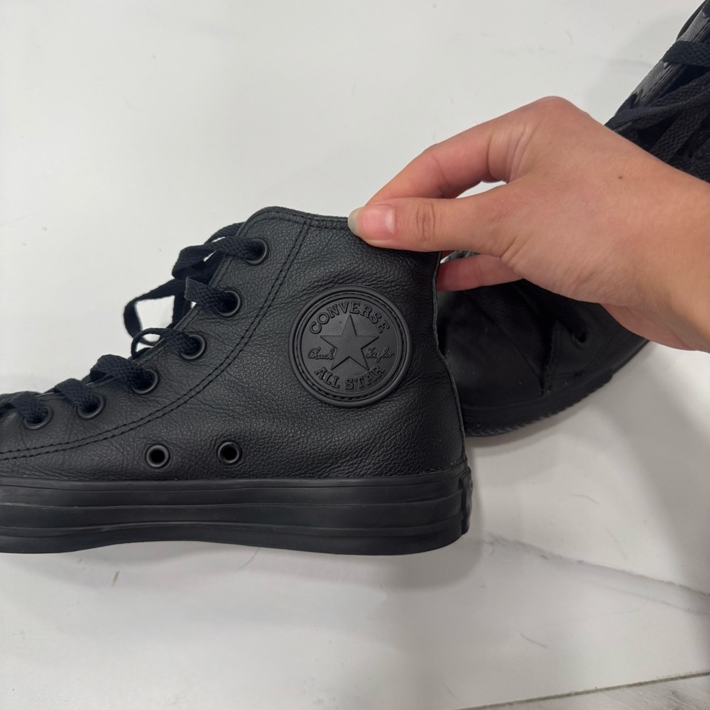 Converse Black Leather High Top Sneakers